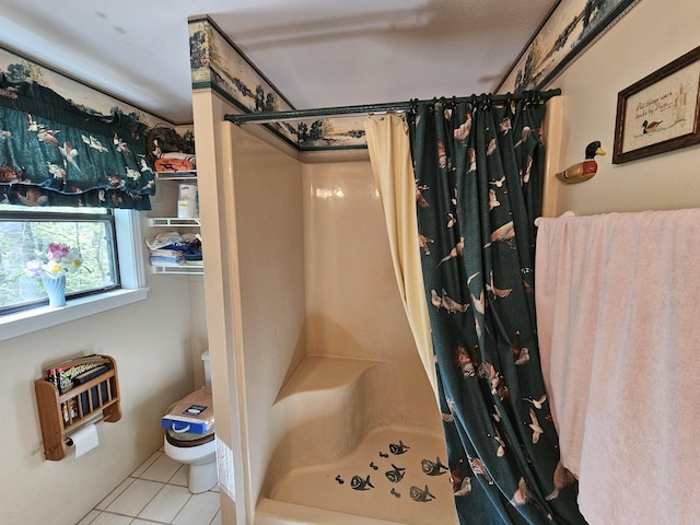 50 Deaton Ln, Parsons, TN 38363 - full bathroom featuring toilet, tile patterned floors, and a shower with curtain