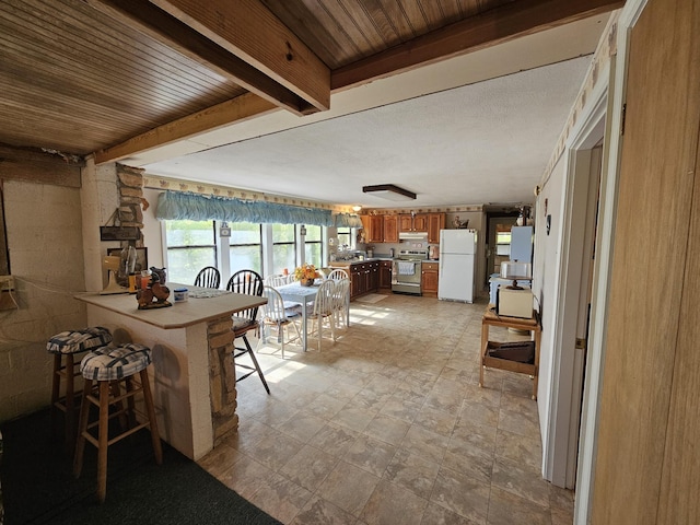 50 Deaton Ln, Parsons, TN 38363 - dining room featuring beamed ceiling
