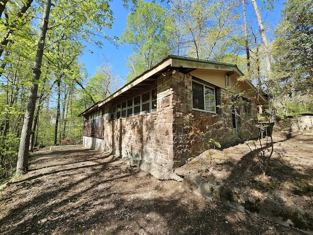 50 Deaton Ln, Parsons, TN 38363 - view of side of home featuring stone siding