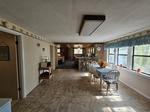 50 Deaton Ln, Parsons, TN 38363 - dining space with stone finish floor and a textured ceiling