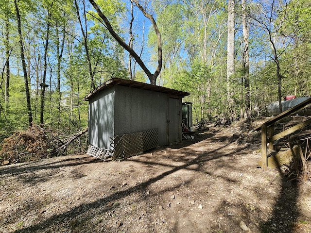 50 Deaton Ln, Parsons, TN 38363 - view of shed featuring a view of trees