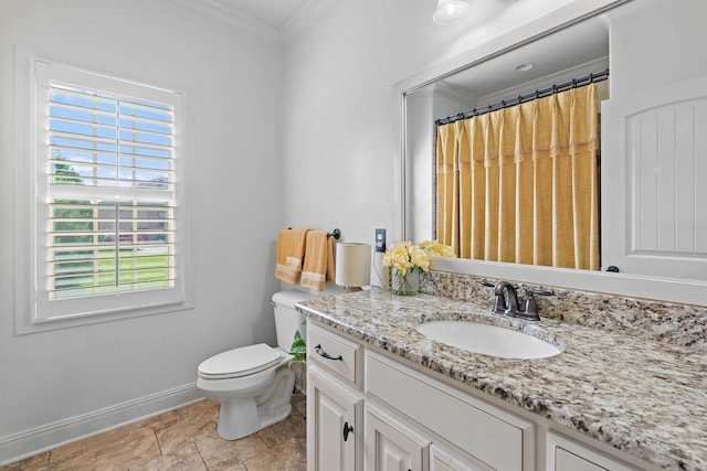 full bathroom featuring ornamental molding, baseboards, toilet, and a healthy amount of sunlight