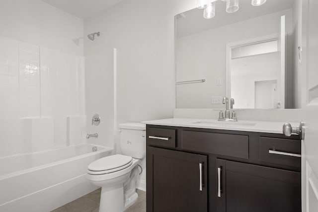 bathroom featuring toilet, vanity, bathtub / shower combination, and tile patterned floors