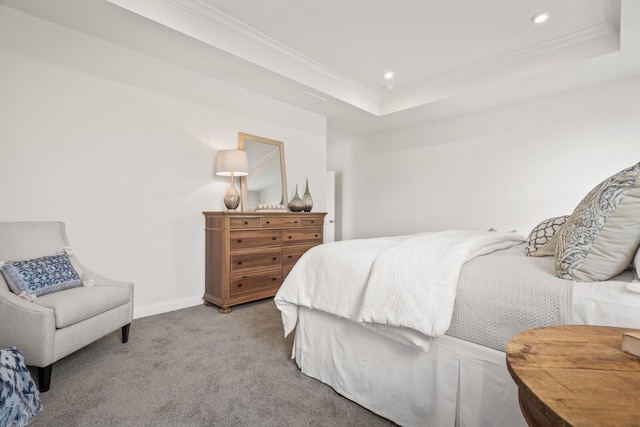 bedroom with crown molding, carpet floors, a tray ceiling, baseboards, and recessed lighting