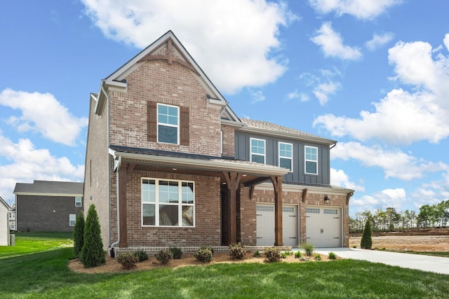 view of front facade with brick siding, a front lawn, concrete driveway, and a garage