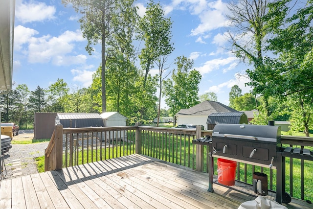 166 Mount Vernon Church Rd, Bethpage, TN 37022 - wooden terrace featuring a storage shed, an outdoor structure, and a yard