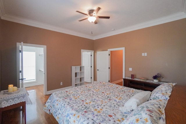 bedroom with light wood-type flooring, crown molding, a ceiling fan, and baseboards