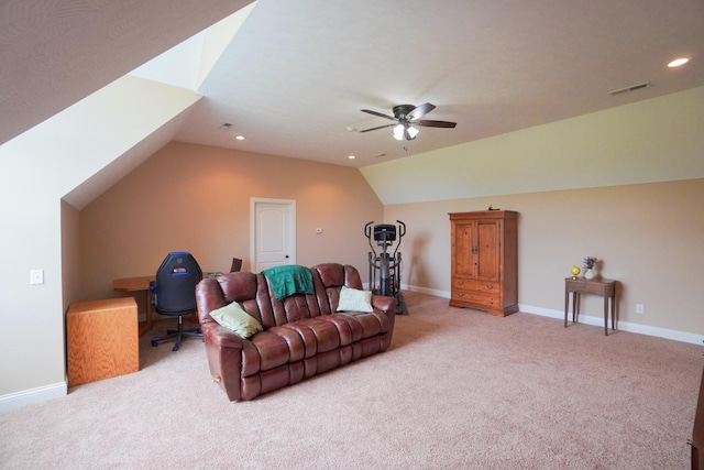 living area with lofted ceiling, light colored carpet, a ceiling fan, and baseboards