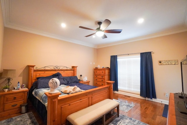 bedroom featuring crown molding, baseboards, recessed lighting, dark wood finished floors, and a ceiling fan