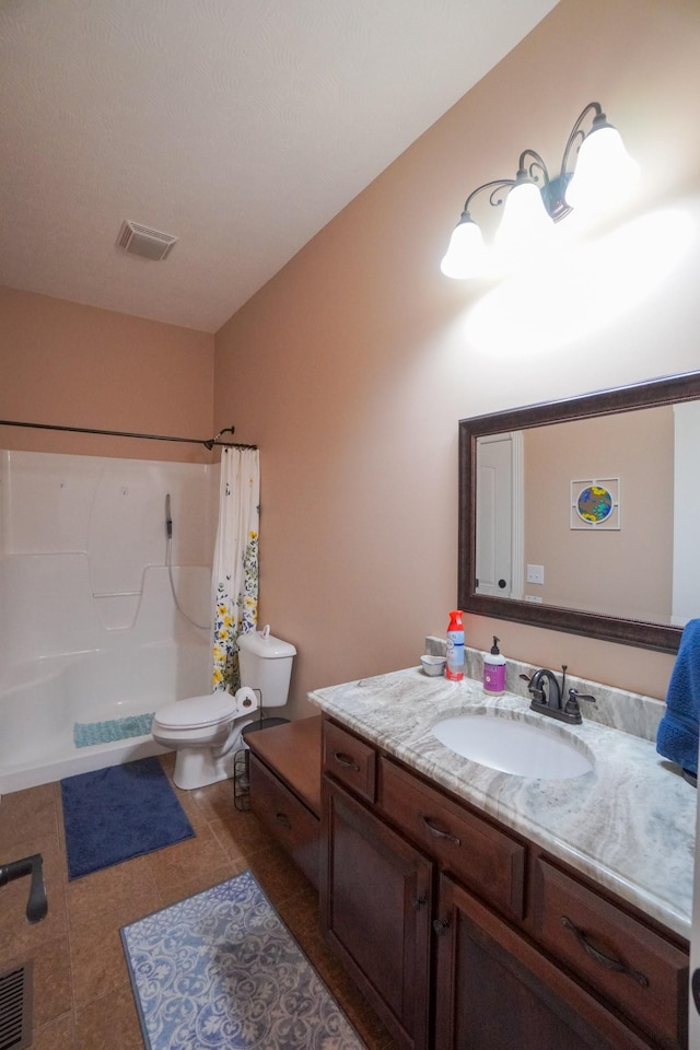 full bath with toilet, tile patterned floors, visible vents, and vanity