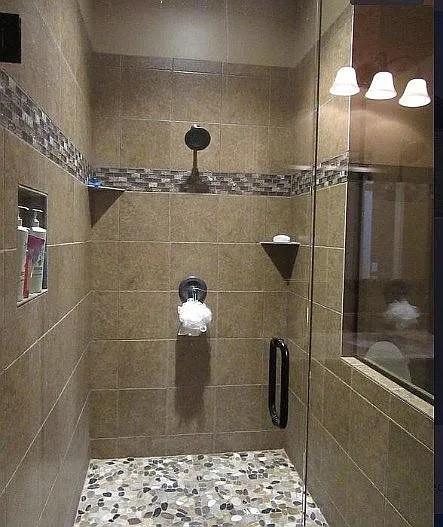 bathroom featuring a shower stall