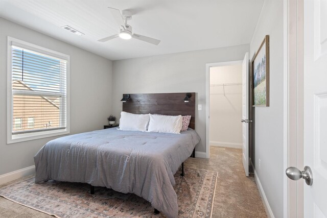 565 Kipton Trl, Lebanon, TN 37087 - bedroom featuring baseboards, a spacious closet, visible vents, ceiling fan, and carpet
