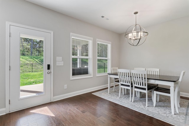 565 Kipton Trl, Lebanon, TN 37087 - dining space featuring wood finished floors, an inviting chandelier, and baseboards