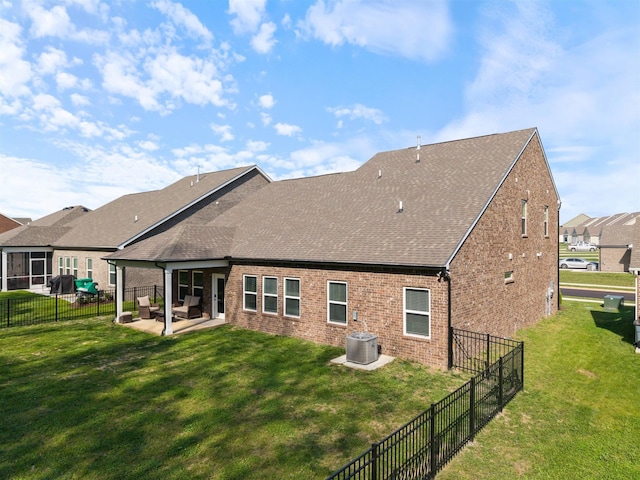 565 Kipton Trl, Lebanon, TN 37087 - rear view of property with a patio, brick siding, a yard, and central AC