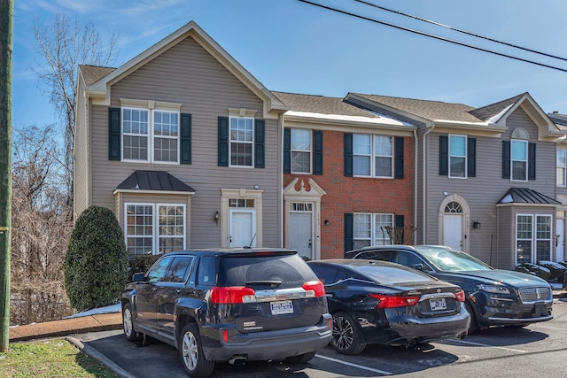 view of front of house featuring uncovered parking