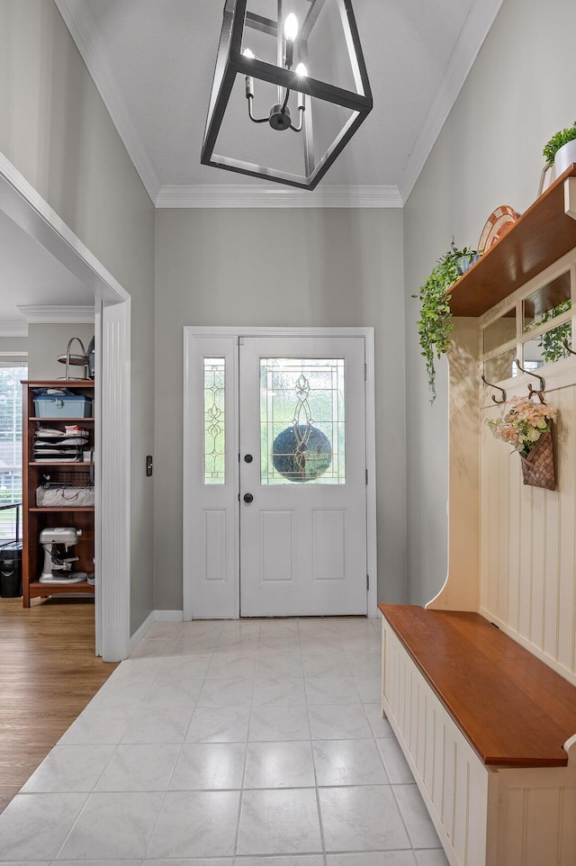 2321 Chimney Hills Dr, Soddy Daisy, TN 37379 - entrance foyer featuring crown molding and a chandelier