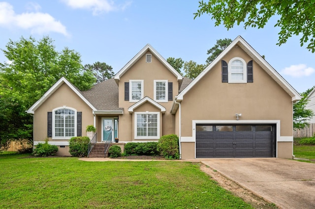 2321 Chimney Hills Dr, Soddy Daisy, TN 37379 - traditional-style home featuring stucco siding, a front yard, driveway, a shingled roof, and an attached garage