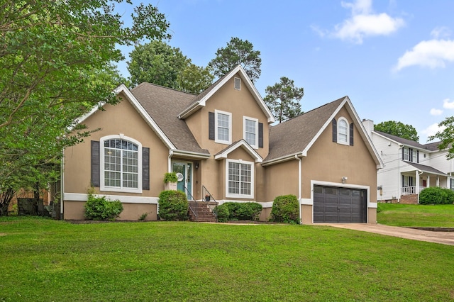 2321 Chimney Hills Dr, Soddy Daisy, TN 37379 - traditional-style house with stucco siding, a front yard, driveway, and an attached garage