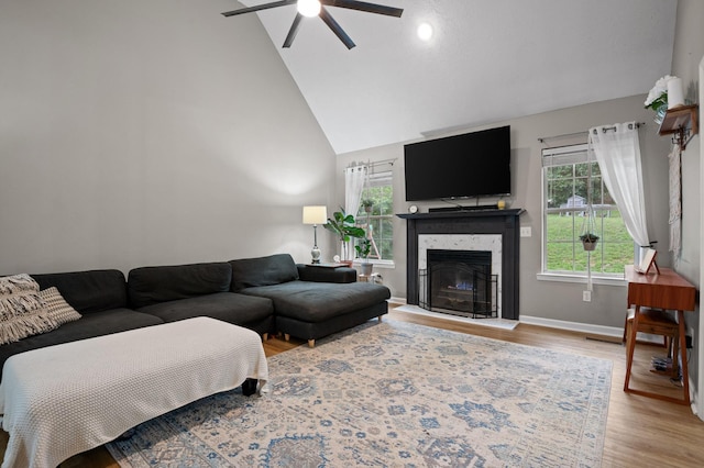 2321 Chimney Hills Dr, Soddy Daisy, TN 37379 - living area with a ceiling fan, plenty of natural light, light wood-type flooring, high vaulted ceiling, and a premium fireplace