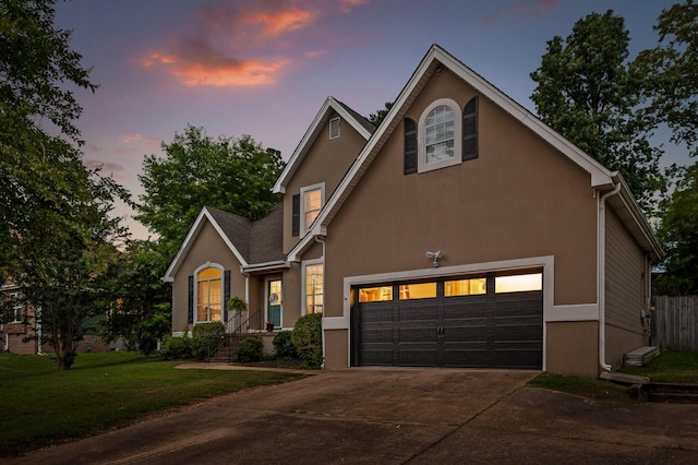 2321 Chimney Hills Dr, Soddy Daisy, TN 37379 - traditional home featuring concrete driveway, a garage, and stucco siding