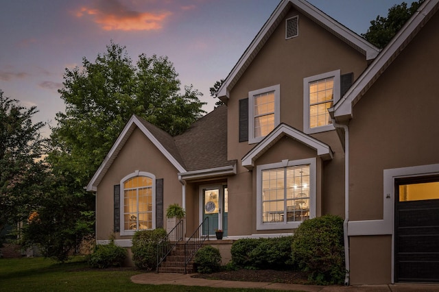 2321 Chimney Hills Dr, Soddy Daisy, TN 37379 - traditional home with stucco siding, roof with shingles, and a front lawn