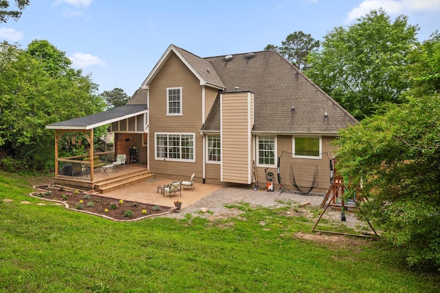 2321 Chimney Hills Dr, Soddy Daisy, TN 37379 - back of property featuring a wooden deck, a patio area, and a yard