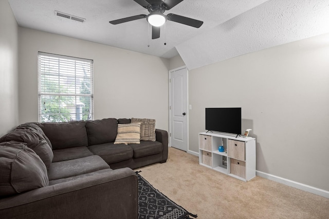 2321 Chimney Hills Dr, Soddy Daisy, TN 37379 - living area featuring a ceiling fan, carpet floors, a textured ceiling, and baseboards