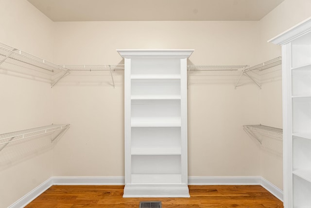 203 Tom Robinson Rd, Franklin, TN 37064 - spacious closet featuring wood finished floors