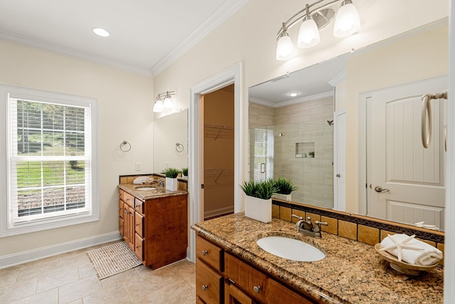203 Tom Robinson Rd, Franklin, TN 37064 - bathroom with a shower stall, crown molding, a sink, and tile patterned floors