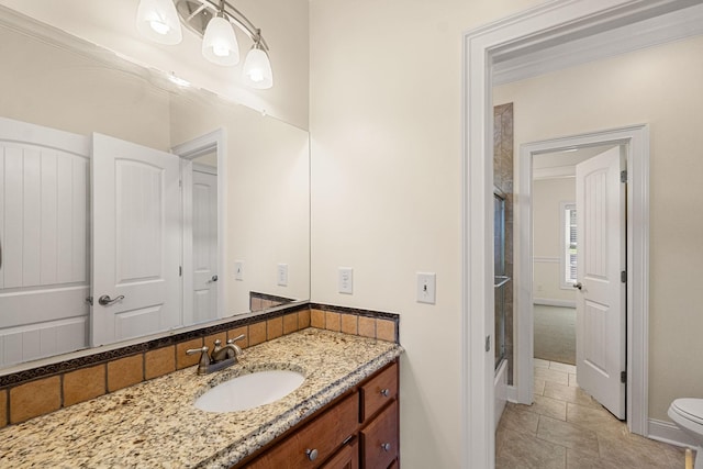 203 Tom Robinson Rd, Franklin, TN 37064 - full bathroom featuring vanity, an enclosed shower, baseboards, and toilet