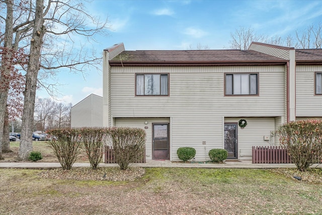 13 Wilshire Heights Dr, Crossville, TN 38558 - back of property featuring a yard and a shingled roof