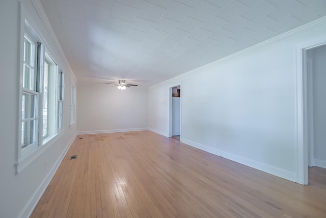 115 Highland Dr, Winchester, TN 37398 - spare room with light wood finished floors, baseboards, visible vents, ceiling fan, and ornamental molding