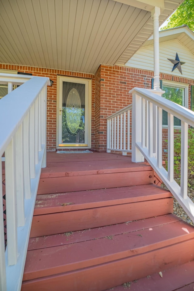 115 Highland Dr, Winchester, TN 37398 - doorway to property featuring a porch and brick siding