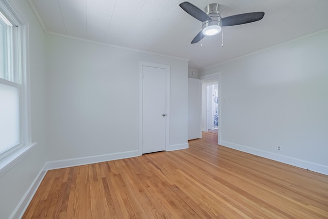 115 Highland Dr, Winchester, TN 37398 - interior space featuring light wood-style flooring, baseboards, a ceiling fan, and crown molding