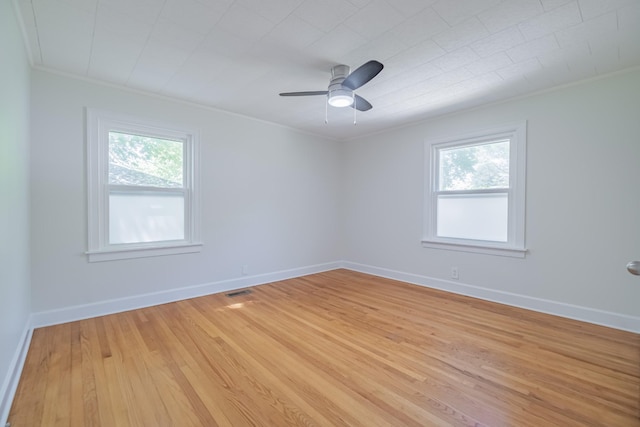 115 Highland Dr, Winchester, TN 37398 - unfurnished room featuring light wood finished floors, a ceiling fan, ornamental molding, and a healthy amount of sunlight
