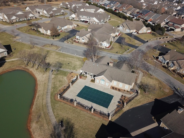aerial view featuring a residential view and a water view