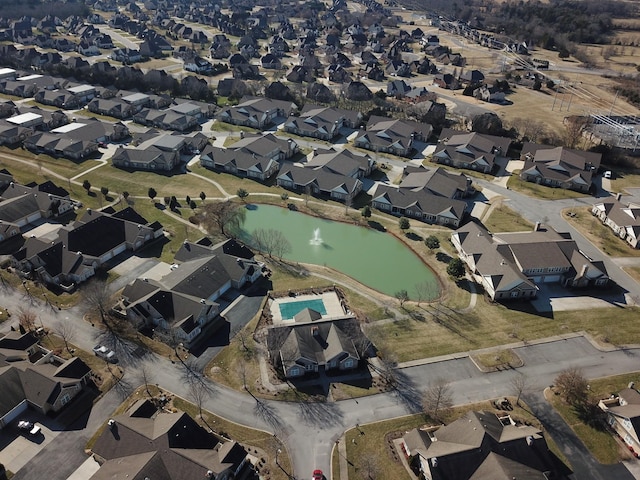 aerial view featuring a residential view and a water view