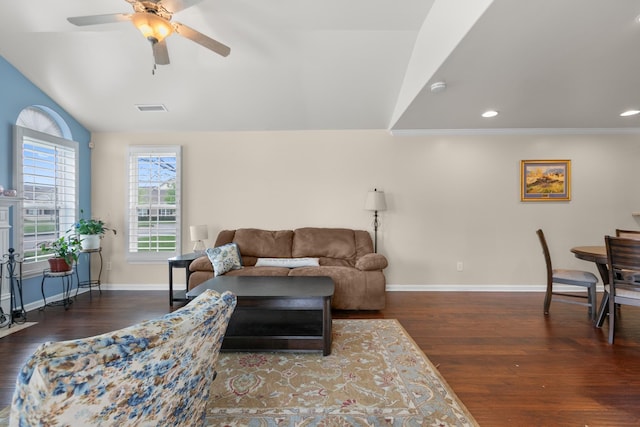 living room with wood finished floors, ceiling fan, baseboards, and lofted ceiling