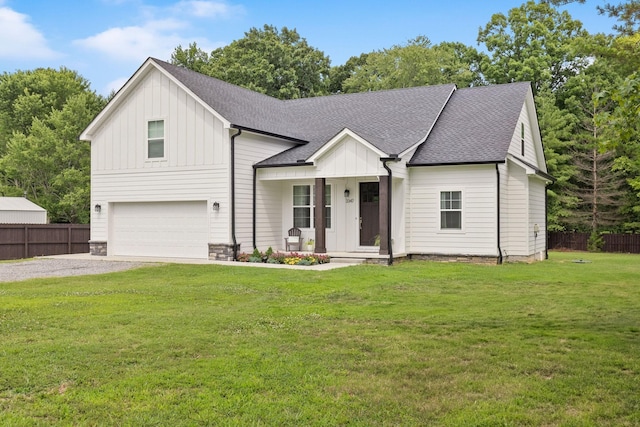 modern farmhouse style home featuring an attached garage, board and batten siding, gravel driveway, and fence