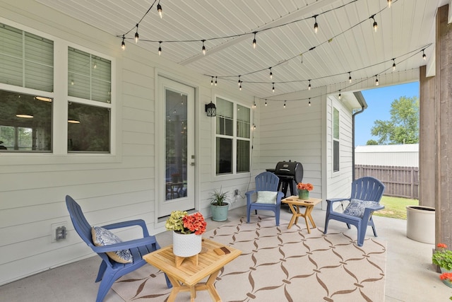 view of patio / terrace with fence