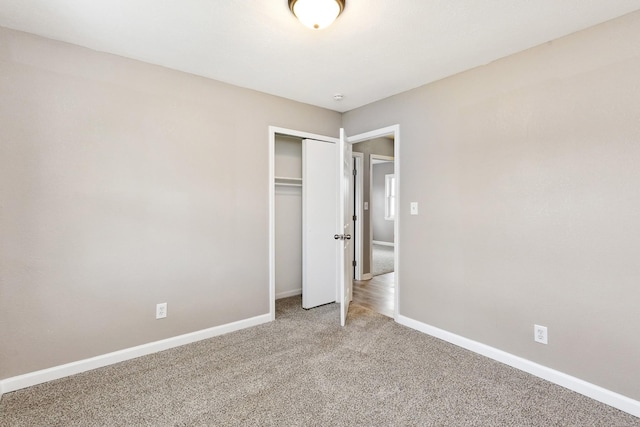 926 Rackley Dr, Pulaski, TN 38478 - unfurnished bedroom with a closet, carpet flooring, and baseboards