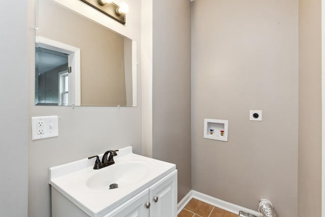 926 Rackley Dr, Pulaski, TN 38478 - bathroom featuring tile patterned flooring, vanity, and baseboards