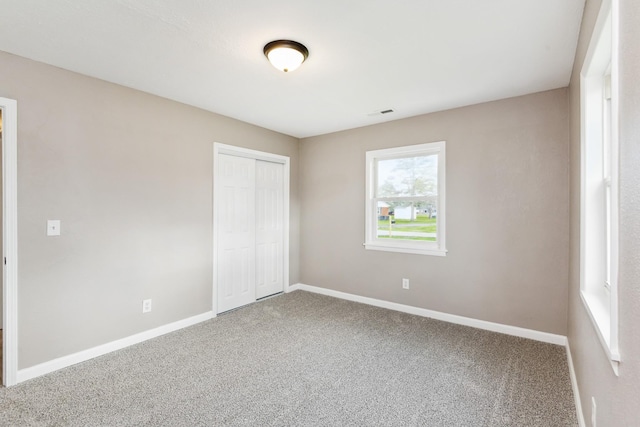 926 Rackley Dr, Pulaski, TN 38478 - unfurnished bedroom featuring a closet, baseboards, and carpet floors