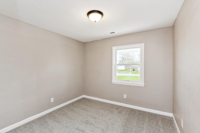 926 Rackley Dr, Pulaski, TN 38478 - spare room featuring carpet flooring, baseboards, and visible vents