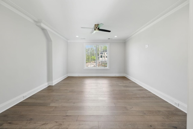 empty room with wood finished floors, recessed lighting, ornamental molding, and ceiling fan