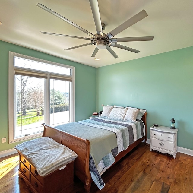 110 Giles Ln, Gallatin, TN 37066 - bedroom featuring dark wood-type flooring, ceiling fan, and baseboards