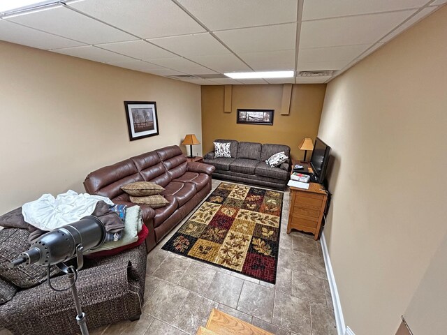 110 Giles Ln, Gallatin, TN 37066 - living area with a paneled ceiling, baseboards, and visible vents
