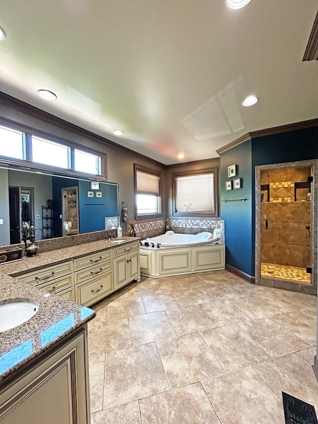 110 Giles Ln, Gallatin, TN 37066 - bathroom featuring crown molding, a shower stall, a bath, visible vents, and a sink