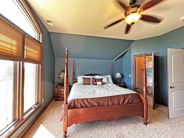 110 Giles Ln, Gallatin, TN 37066 - bedroom with light carpet, ceiling fan, vaulted ceiling, and visible vents