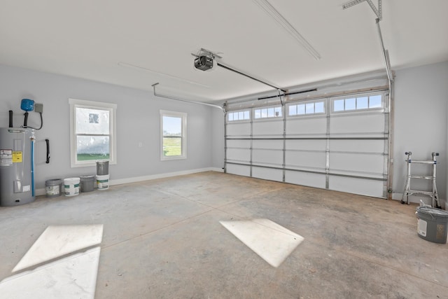 garage with electric water heater and a garage door opener